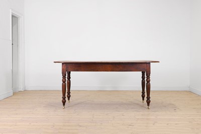 Lot 71 - A provincial elm kitchen table