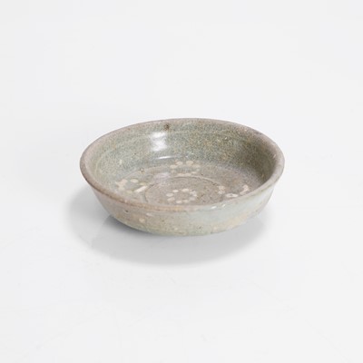 Lot 309 - A Korean celadon-glazed saucer