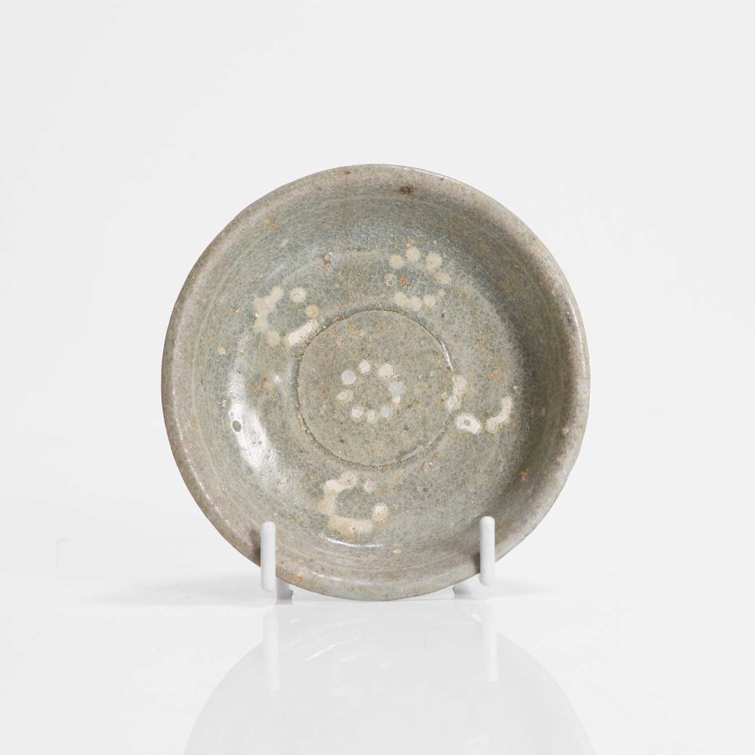 Lot 309 - A Korean celadon-glazed saucer