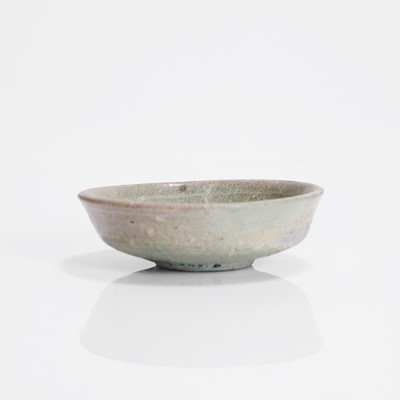 Lot 309 - A Korean celadon-glazed saucer