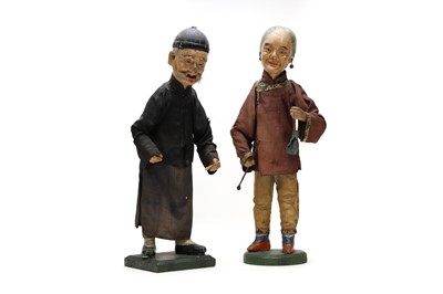 Lot 250 - A pair of Chinese dolls