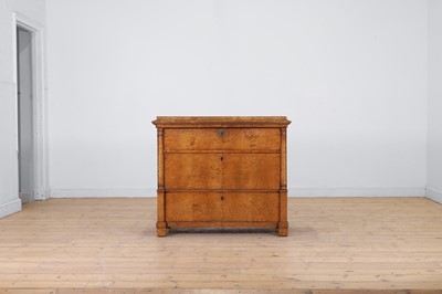 Lot 629 - An Empire birch commode