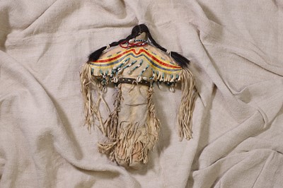 Lot 299 - A Native American beaded and quilled hide doll