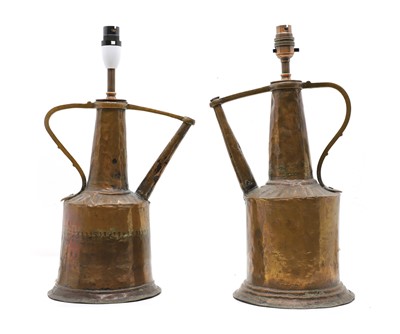 Lot 570 - A pair of copper ewer form table lamps