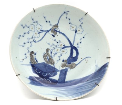 Lot 271 - A Chinese copper red and underglaze blue dish