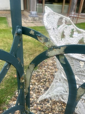 Lot 463 - A painted metal garden bench