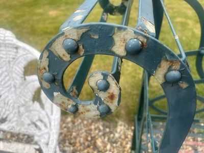Lot 463 - A painted metal garden bench