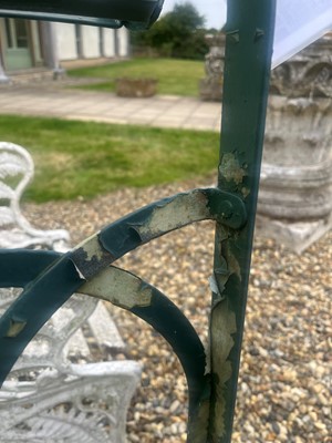 Lot 463 - A painted metal garden bench