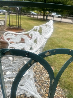 Lot 463 - A painted metal garden bench