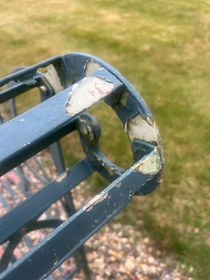 Lot 463 - A painted metal garden bench