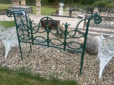 Lot 463 - A painted metal garden bench