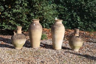 Lot 693 - A pair of terracotta jars