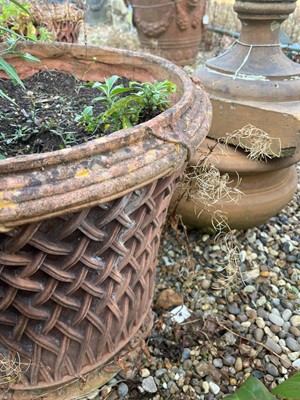 Lot 712 - A pair of terracotta garden planters