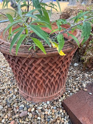 Lot 712 - A pair of terracotta garden planters