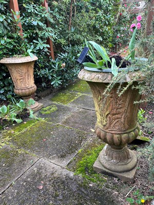 Lot 714 - A pair of garden urns