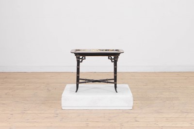 Lot 409 - A papier mâché japanned tray top table
