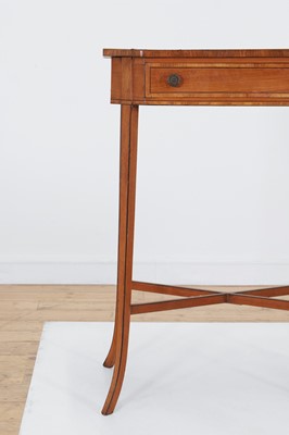 Lot 425 - A near pair of George III satinwood occasional tables