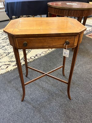 Lot 425 - A near pair of George III satinwood occasional tables