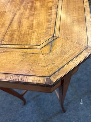 Lot 425 - A near pair of George III satinwood occasional tables