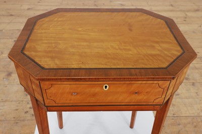 Lot 425 - A near pair of George III satinwood occasional tables