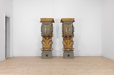 Lot 575 - A pair of large painted and parcel-gilt wooden pilasters