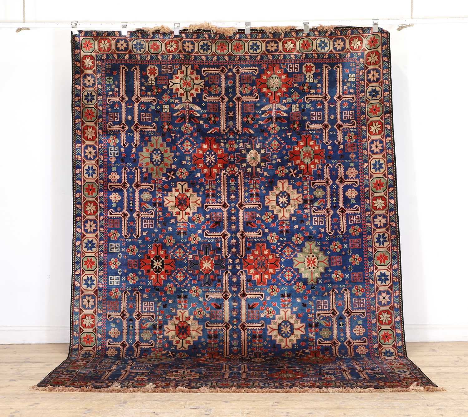 Lot 420 - A Kazak silk rug