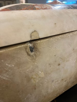 Lot 586 - A specimen marble casket