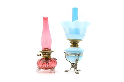 Lot 260 - A Victorian blue opalescent glass oil lamp