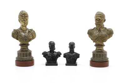 Lot 306 - A pair of patinated busts