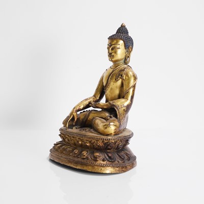 Lot 148 - A Tibetan gilt-bronze Shakyamuni Buddha