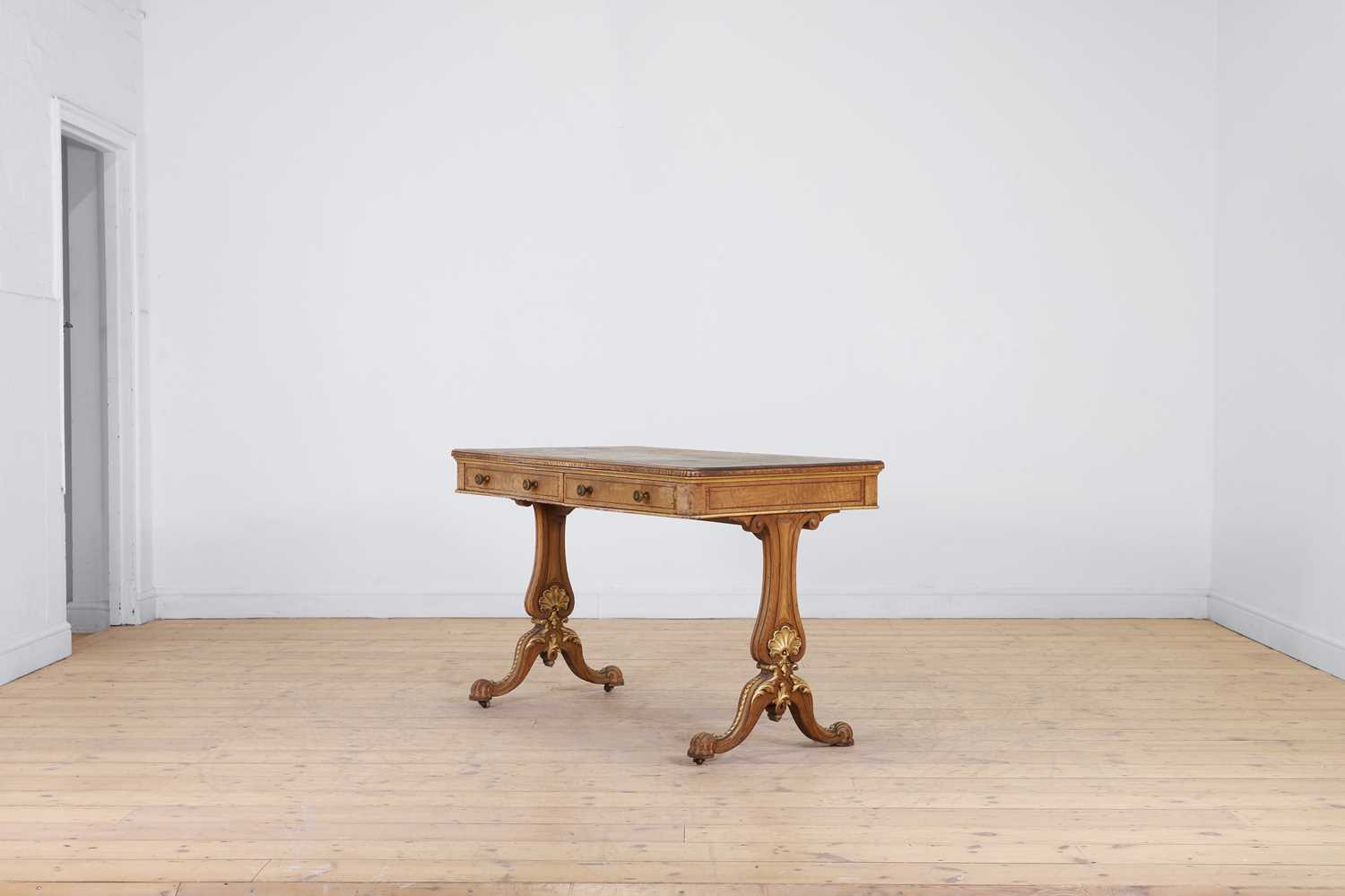 Lot 105 - A Victorian Hungarian ash, rosewood and tulipwood library table by Holland & Sons