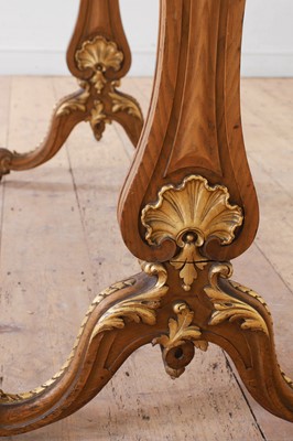 Lot 105 - A Victorian Hungarian ash, rosewood and tulipwood library table by Holland & Sons
