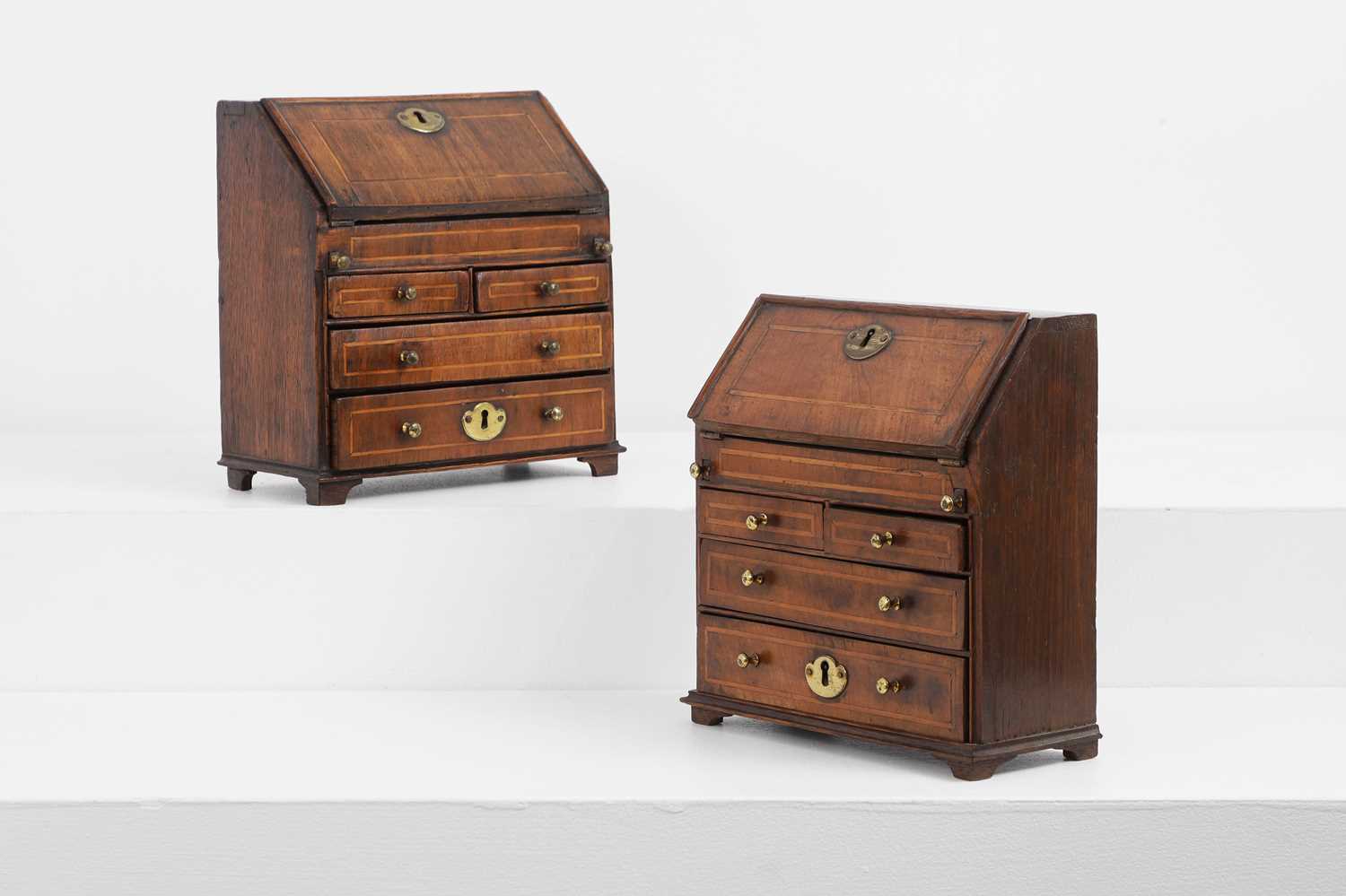 Lot 669 - Two George II miniature bureaux