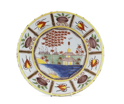 Lot 193 - A polychrome painted Delftware plate