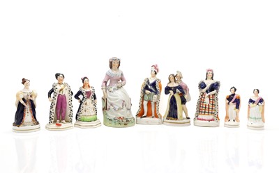 Lot 110 - A group of nine Staffordshire pottery theatrical figures