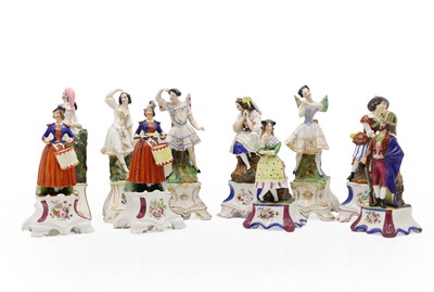 Lot 99 - Five pairs of figural porcelain taper stands