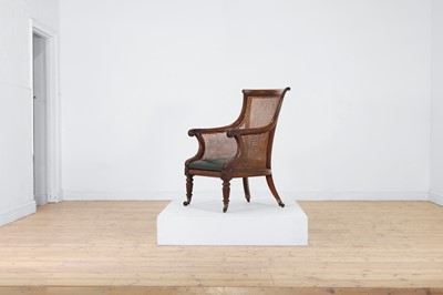 Lot 519 - A George IV mahogany bergère library armchair