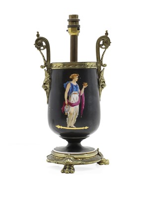 Lot 670 - A neoclassical glass urn lamp