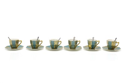 Lot 134 - A cased set of six Royal Doulton demitasse cups and saucers