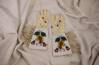 Lot 350 - A pair of Native American beaded hide gauntlets