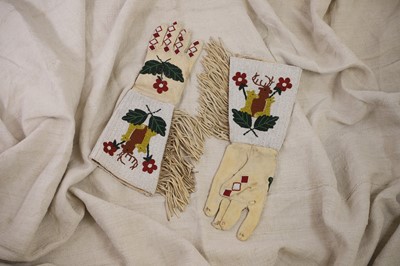 Lot 350 - A pair of Native American beaded hide gauntlets