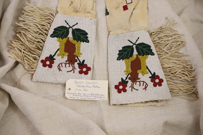 Lot 350 - A pair of Native American beaded hide gauntlets