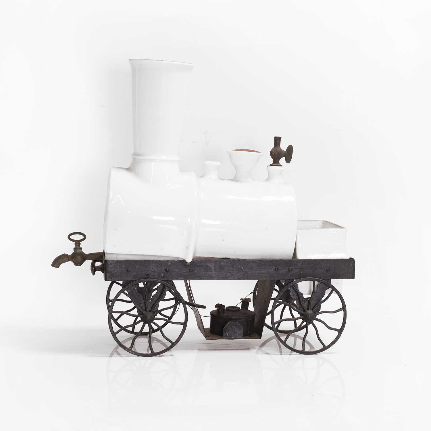 Lot 122 - A novelty steam engine ceramic brandy decanter