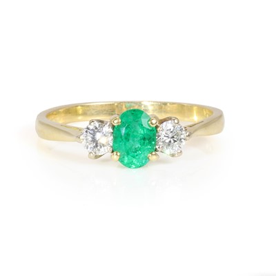 Lot 242 - An 18ct gold, emerald and diamond ring, retailed by Asprey