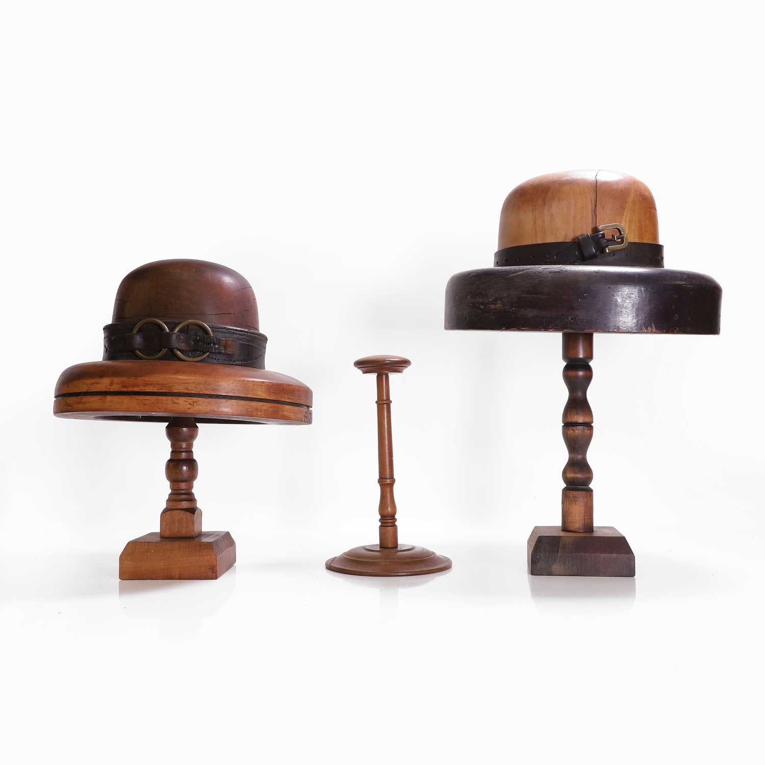 Lot 43 - Two milliner's treen hat formers