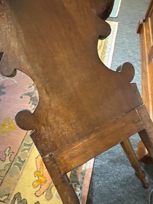 Lot 32 - A pair of Regency oak hall chairs