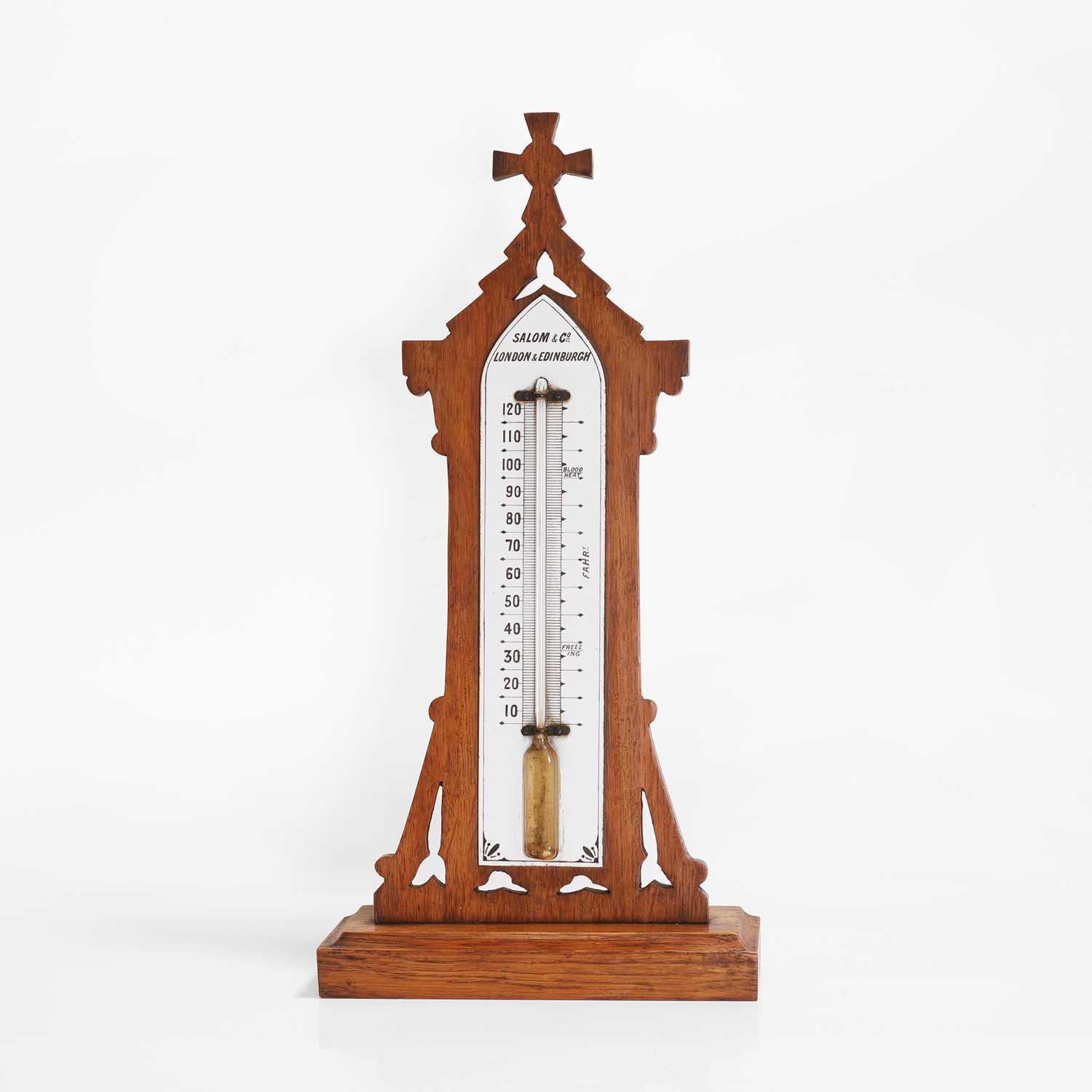 Lot 33 - A Victorian Gothic oak-framed thermometer