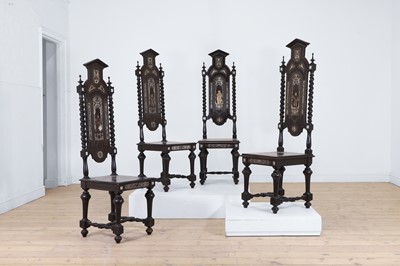 Lot 619 - Two pairs of ebonised fruitwood, ivory and silvered-brass inlaid hall chairs