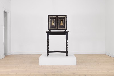 Lot 99 - An ebonised fruitwood, ivory-inlaid and bronze-mounted table cabinet