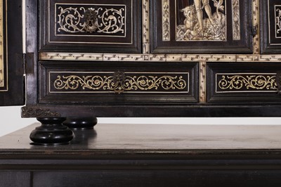 Lot 99 - An ebonised fruitwood, ivory-inlaid and bronze-mounted table cabinet